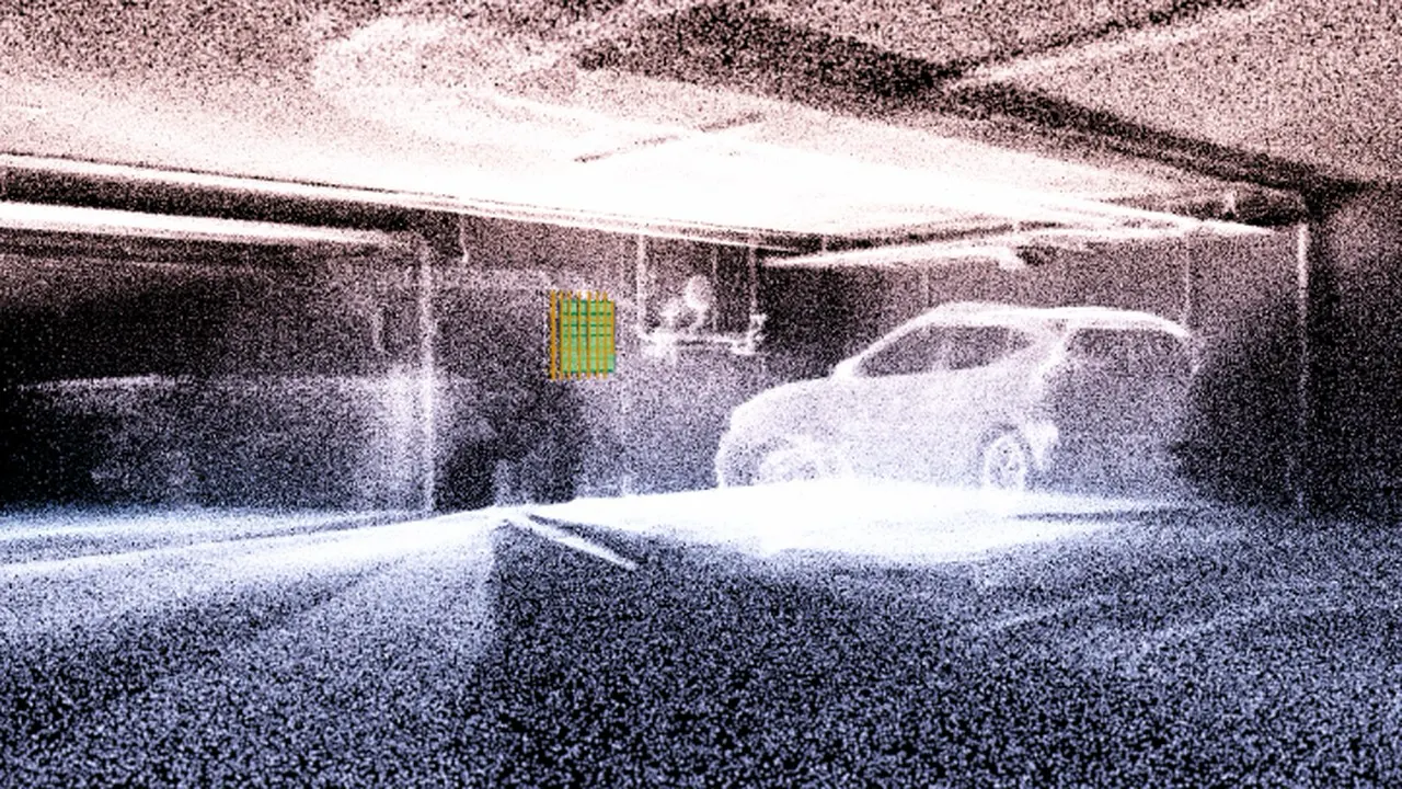 Point cloud of a parking structure with a car visible inside the 3D model